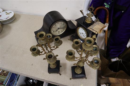 A Victorian black slate clock garniture and a mantel clock